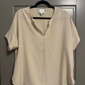 Women’s oversized cream blouse